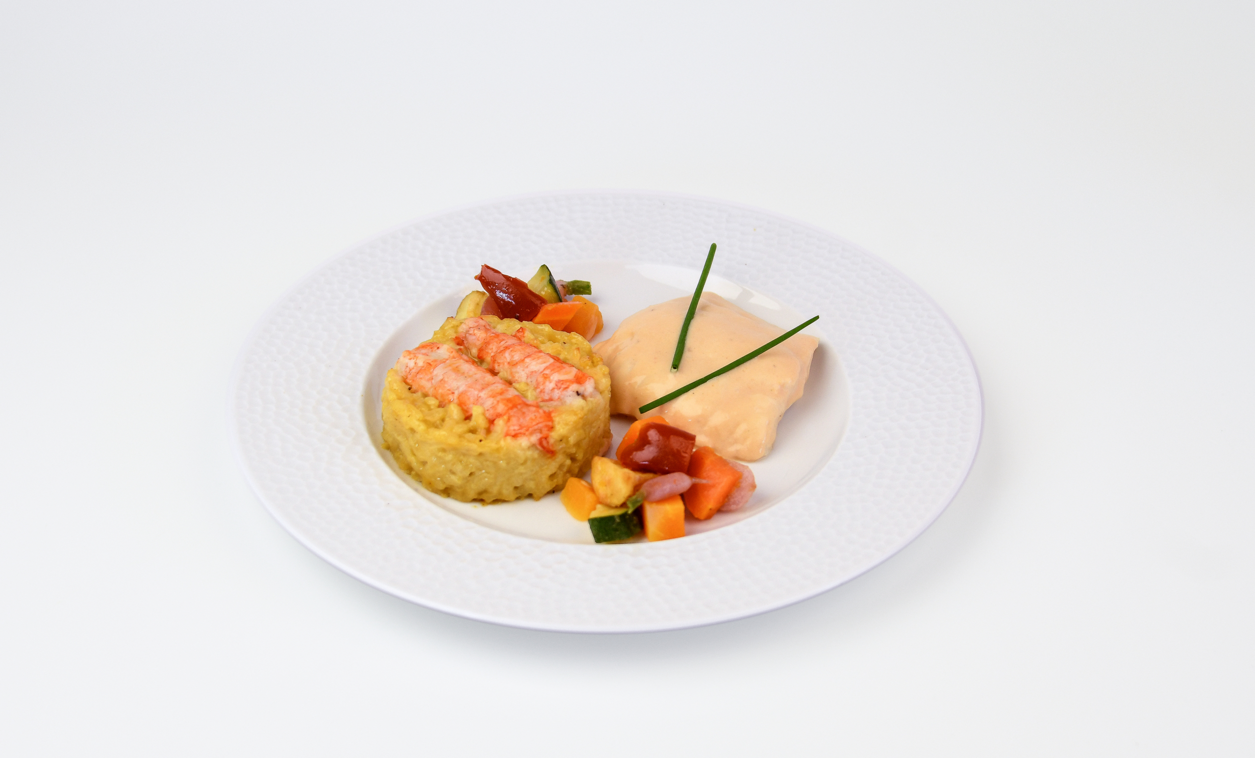 Panaché de bar de ligne et langoustines